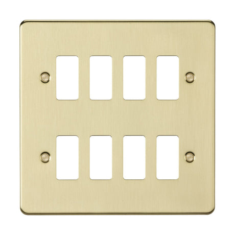 The 8 Gang Grid Faceplate in brushed brass is expertly crafted from premium grade steel. It features six rectangular openings arranged in two rows of three for toggle switches and includes four screw holes to ensure secure mounting.
