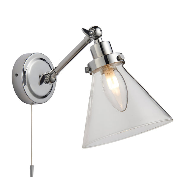 Endon Brackwood bathroom wall light in chrome with adjustable arm, clear glass conical shade, lit G9 bulb, and pull cord switch on a white background.