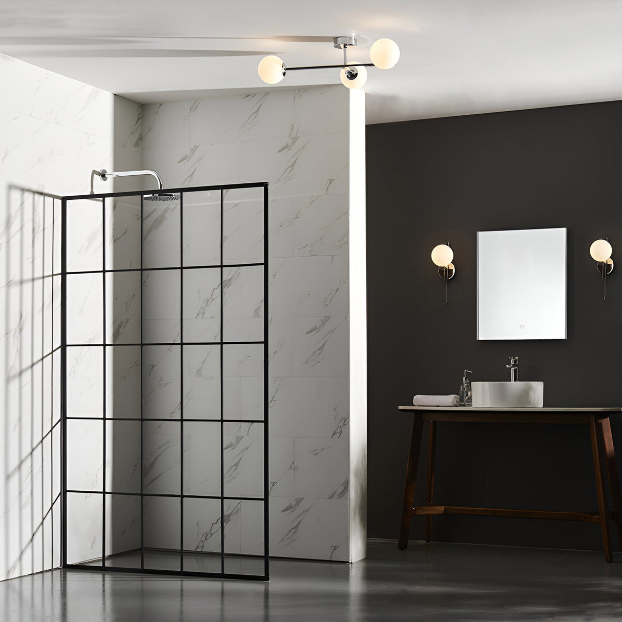 Kelham 3 Light Semi-Flush Bathroom Ceiling Light in chrome with globe glass shades, shown above a walk-in shower with black-framed glass panel.