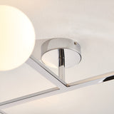 Kelham 3 Light Semi-Flush Bathroom Ceiling Light in chrome, showing the ceiling mount, arm, and globe shade against a textured white ceiling.