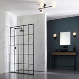 Kelham Bathroom Wall Light in black, single opal glass globe with pull cord, shown either side of a mirror in a dark bathroom setting.