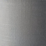 Close-up of the Endon Brenley V3 six-light pendant's charcoal linen-mix shade, showing the woven fabric texture and brushed metallic inner lining.