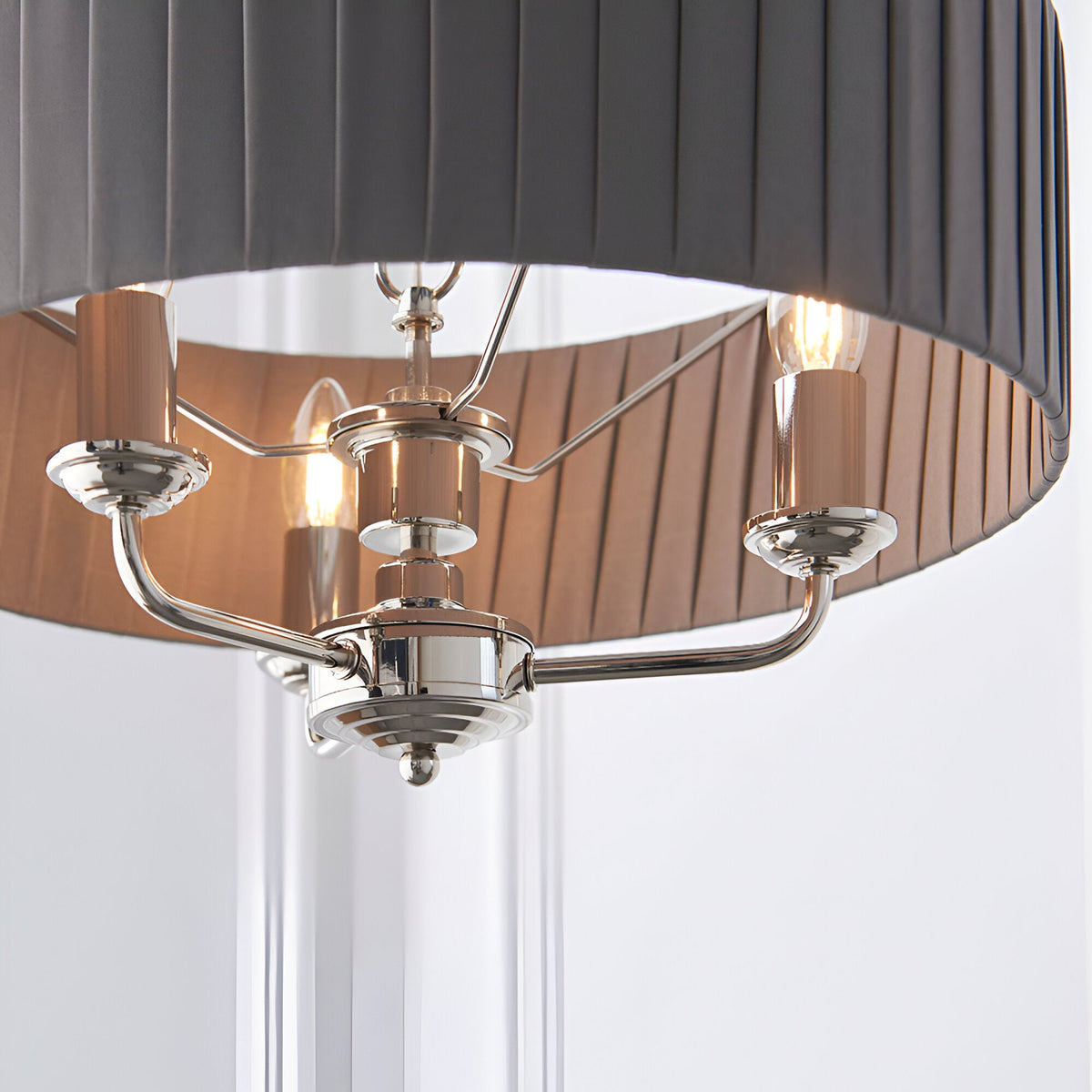 Brenley V2 3-light pendant with pleated grey fabric shade, reflective inner lining, and nickel arms holding candle-style E14 bulbs.