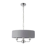 Brenley V2 3-light pendant with pleated grey fabric drum shade, nickel ceiling rose, chain suspension, and three-arm chrome fitting on a white background.