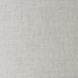 Close-up of natural linen fabric texture in light beige, representing the shade material used on the Brenley 2 Light Wall Light in chrome and brass.