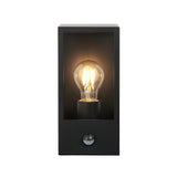 Castwood outdoor wall light in matt black steel with clear glass panels, exposed bulb, and integrated PIR sensor, shown on a plain white background.