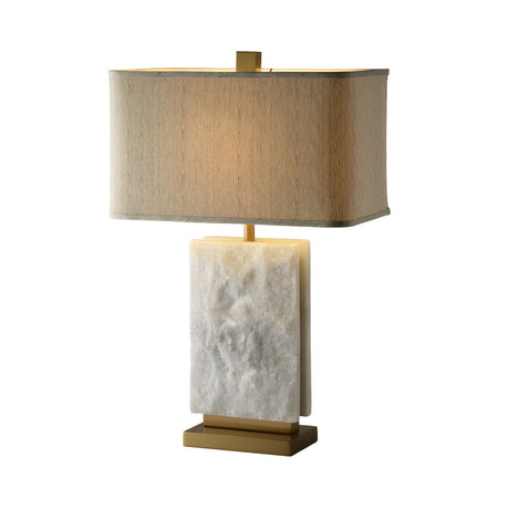 The Axis 1 Light Alabaster Table Lamp features a brass finish, soft white alabaster, a rectangular beige fabric shade, a white marble base, and gold accents, shown against a plain white background.