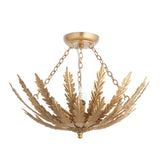 Endon Colette 3 light flush ceiling light in gold with layered metal leaf design, chain detailing and E14 candle lamp, shown on a white background.