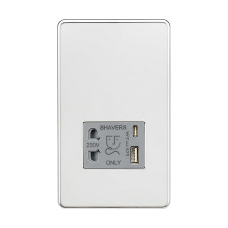 The Shaver Socket With Dual USB - Polished Chrome (Grey Insert) is designed for convenience, featuring a polished chrome finish. It includes a 230V outlet and two USB charger ports labeled 5V max 2.1A, with a clearly marked shaver icon to indicate its specific use.