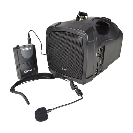 Adastra H25B portable PA speaker in black ABS housing with control panel, shown with bodypack transmitter and neckband microphone on a white background.