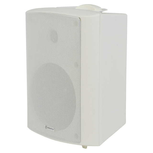 The Adastra BP6V-W 6.5" 120W 100V Background Outdoor Speaker in white features a rectangular design with a mesh front grill, revealing a circular speaker behind it. This weatherproof and freestanding speaker is rated IP54 for durability and includes the brand logo in the bottom corner of the grill.