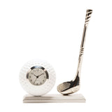 Golf Ball and Club Miniature Mantel Clock in silver and white, featuring a dimpled golf ball clock face with black numerals beside an angled silver club on a stepped base, plain white background.