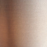 Close-up of the Endon Bramdon Floor Lamp's natural mixed-linen cylinder shade, showing the woven fabric texture in warm earthy tones.