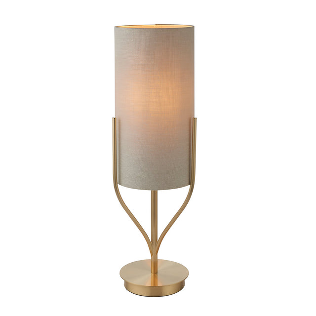 Endon Bramdon table lamp with satin brass plated metal frame, forked upright base, and natural linen cylinder shade on a white background.