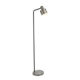 Endon Carlbourne industrial floor lamp with a brushed silver cylindrical shade, matt black stem and silver round base, shown on a plain white background.