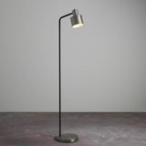 Endon Carlbourne industrial floor lamp with brushed silver cylindrical shade, matt black stem and silver disc base, shown against a plain light grey backdrop.