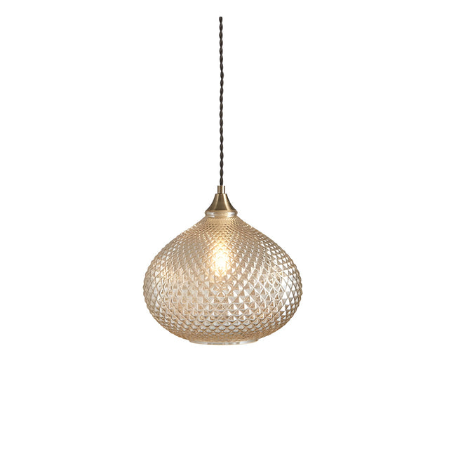 Endon Caldstead pendant light with champagne reflective glass shade in onion shape, antique brass fitting and black twisted fabric flex, on white background.