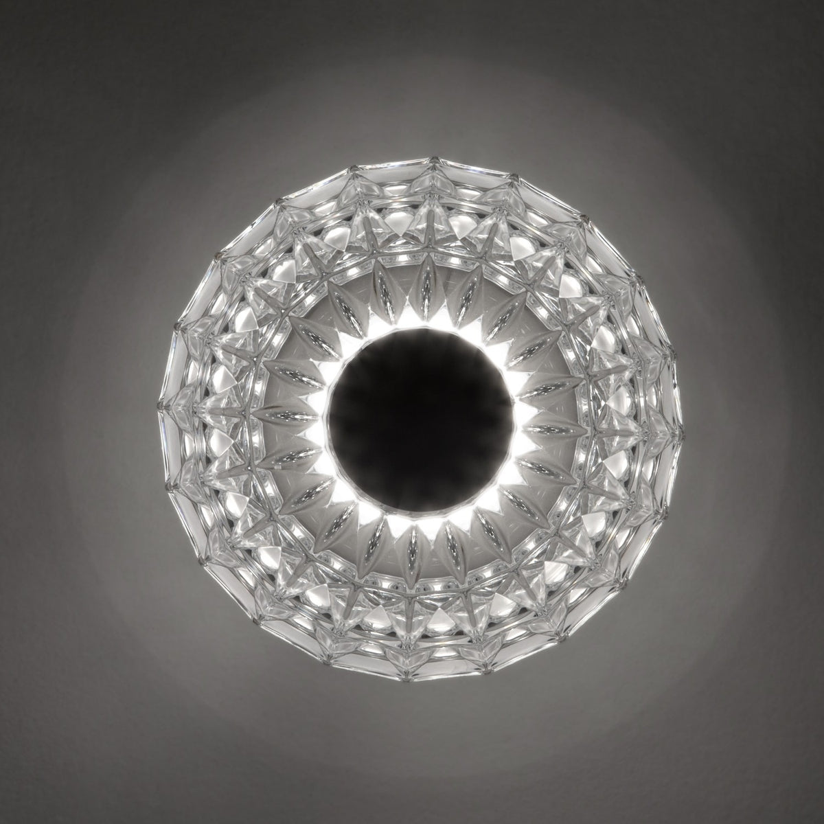 Deco Crystal Semi-Flush Ceiling Light in chrome, viewed from below, showing a faceted crystal glass bowl in a radial pattern with a central chrome disc, lit against a grey background.