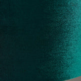 Close-up of the Brendon Table Lamp's green velvet shade, showing textured fabric weave in a rich emerald tone.