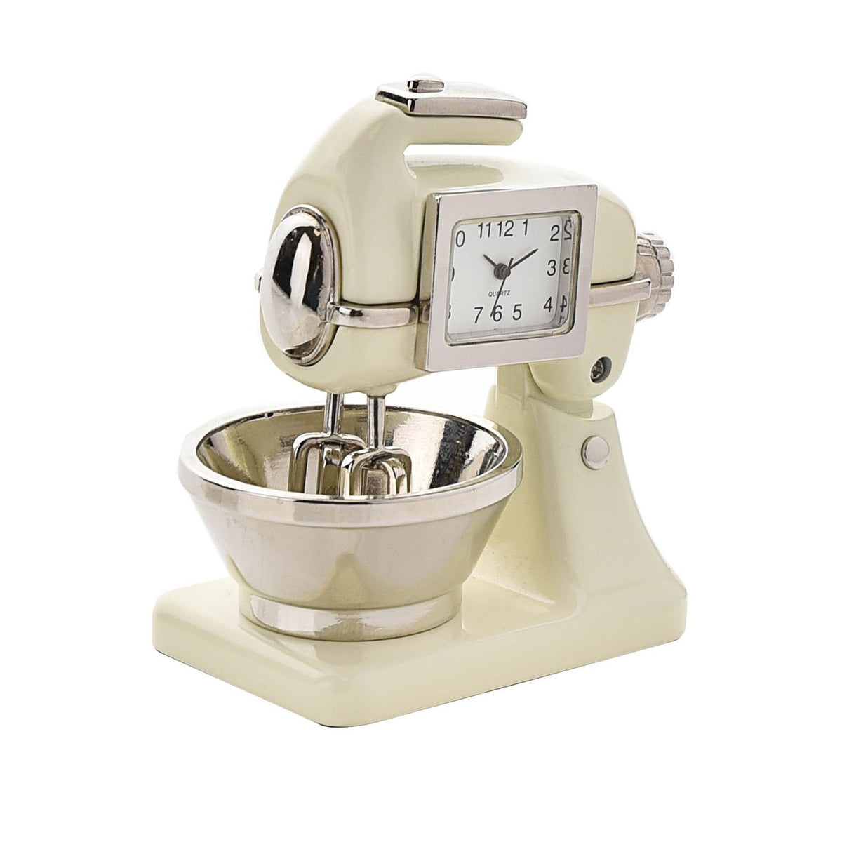 Miniature mantel clock shaped like a food mixer in glossy beige metal, with a silver-framed clock face, beaters, and mixing bowl, set against a plain white background.