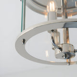 Close-up of Endon Hollis 3 Light Flush Ceiling Light in nickel, showing the polished ring frame, curved arm, glass shade edge and lit E14 candle lamp.