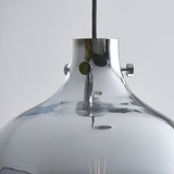 Close-up of the Castworth Glass Pendant in chrome, showing the domed glass shade, chrome fitting with screws, and grey fabric cable against a plain background.