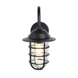 Chartgrove Outdoor Wall Light in black aluminium, single E27 bulb with caged metalwork over a clear glass shade, shown lit on a plain white background.