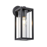 Endon Bramwood outdoor wall light in textured black aluminium with a rectangular lantern frame, clear glass panels, and an E27 filament bulb inside.