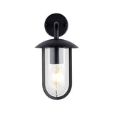 Black aluminium Chartley outdoor wall light with curved arm, domed top, and clear glass shade revealing an E27 filament bulb.