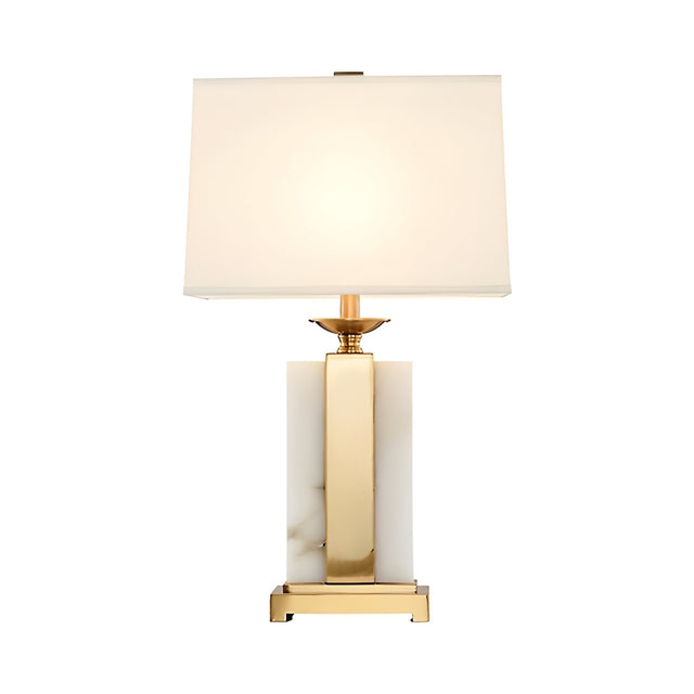 The Chandor 1 Light Alabaster Table Lamp in Brass & Soft White features a rectangular white shade and gold-accented alabaster base, shown here photographed against a white background.