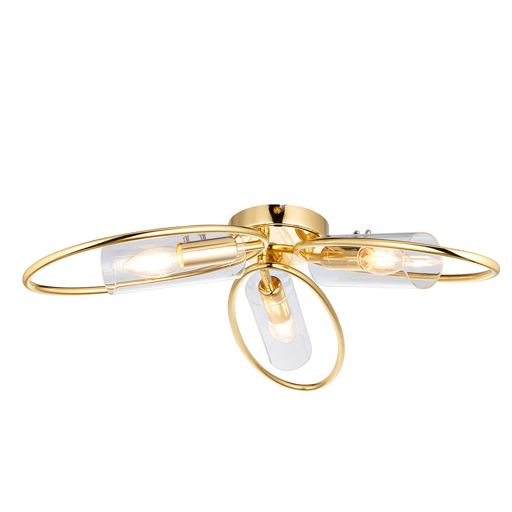 Endon Hartley 3 light semi-flush ceiling light in brass with three clear glass cylinder shades on looped arms, shown on a white background.