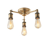 Endon Brackley 3 light semi-flush ceiling light in brass with three outward arms and exposed E27 filament bulbs, shown on a white background.
