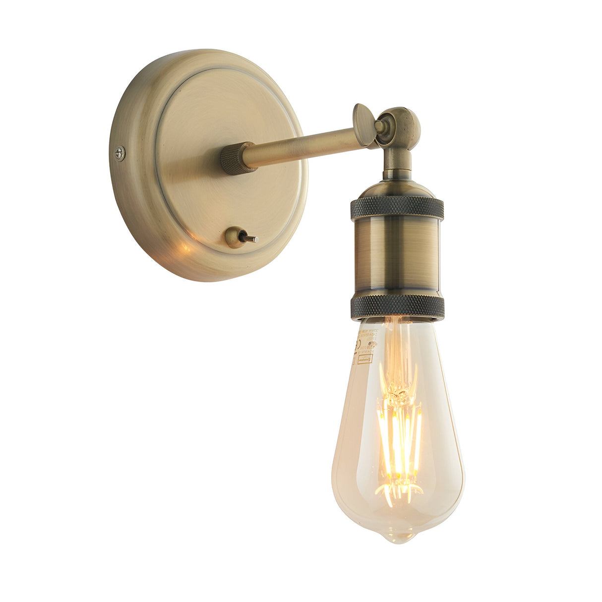 Brackley Wall Light in antique brass with an adjustable industrial-style arm, exposed E27 bulb holder, and round wall plate, shown on a plain white background.