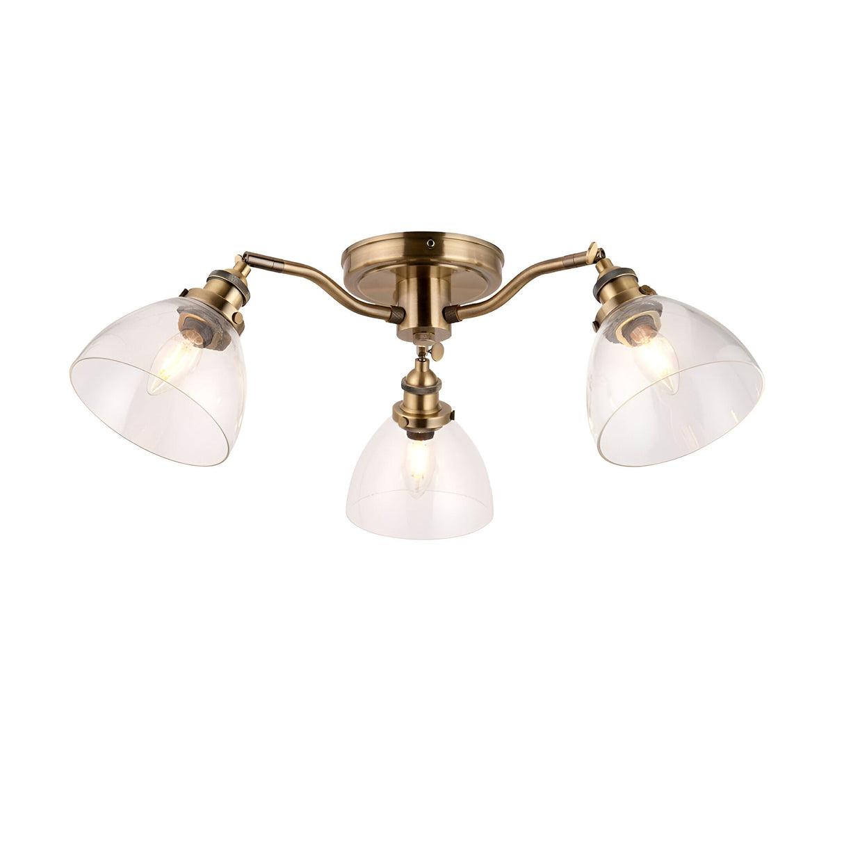 Wentworth 3-light semi-flush ceiling light in antique brass, three angled arms with clear glass dome shades, shown on a plain white background.