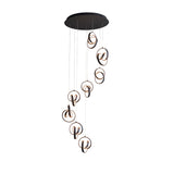 Endon Bevwell 8 light pendant in matt black, featuring a cascading cluster of looped metal rings with integrated LEDs on adjustable clear flex drops.