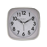 Square plastic alarm clock in white with silver trim, bold black Arabic numerals, sweep second hand and rounded corners, shown on a plain white background.