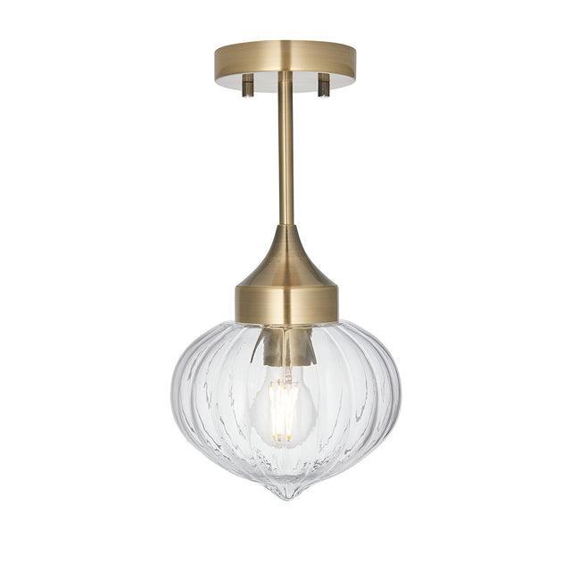 Endon Aldridge semi-flush ceiling light in antique brass with a ribbed clear glass onion-shaped shade and slim drop rod, on a white background.