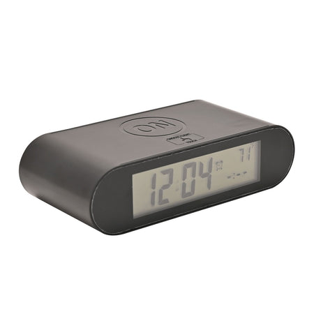 Black plastic oval flip alarm clock with LCD display showing time and temperature, top ON button, and SNOOZE/LIGHT touch pad, shown on a plain white background.