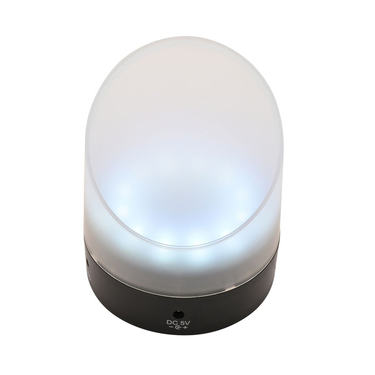 Round LCD flip alarm clock with frosted clear plastic shade glowing white and a black plastic base, upright on a plain white background.