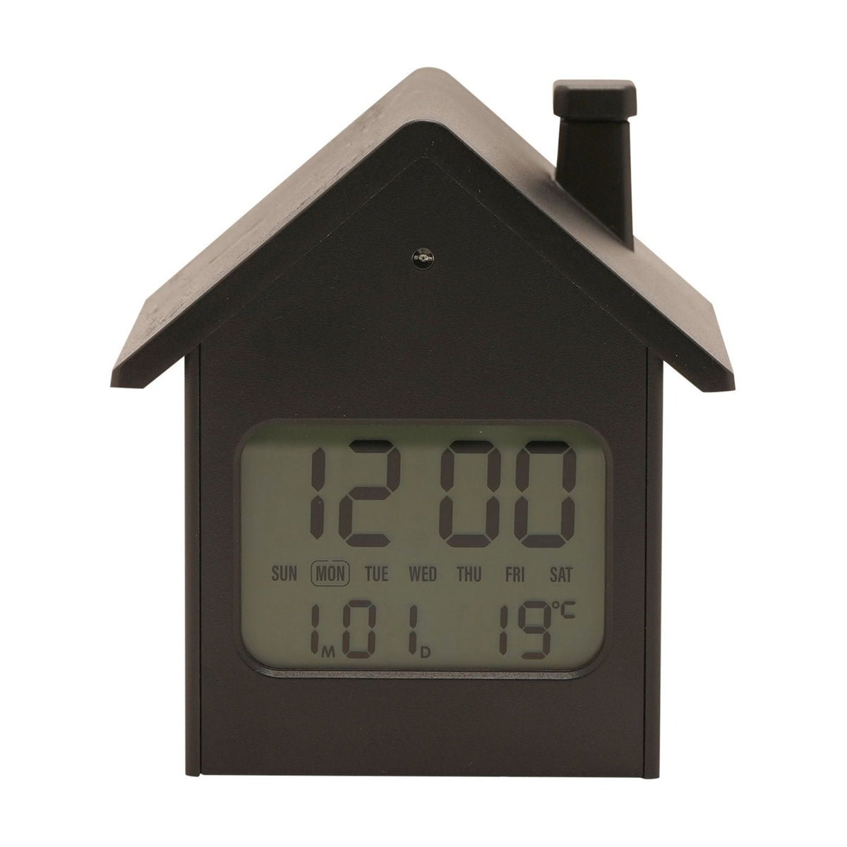 House-shaped digital alarm clock in black with pitched roof and chimney, LCD display showing time, day and temperature, set against a plain white background.