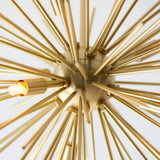 Close-up of the Endon Merrick 6 Light Semi-Flush Ceiling Light in brass, showing the central sphere and radiating spike arms with a lit G9 lamp.