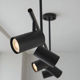 Calder 5 Light Spotlight Bar in matt black, ceiling-mounted with adjustable cylindrical heads, GU10 bulbs, shown against a plain white ceiling.