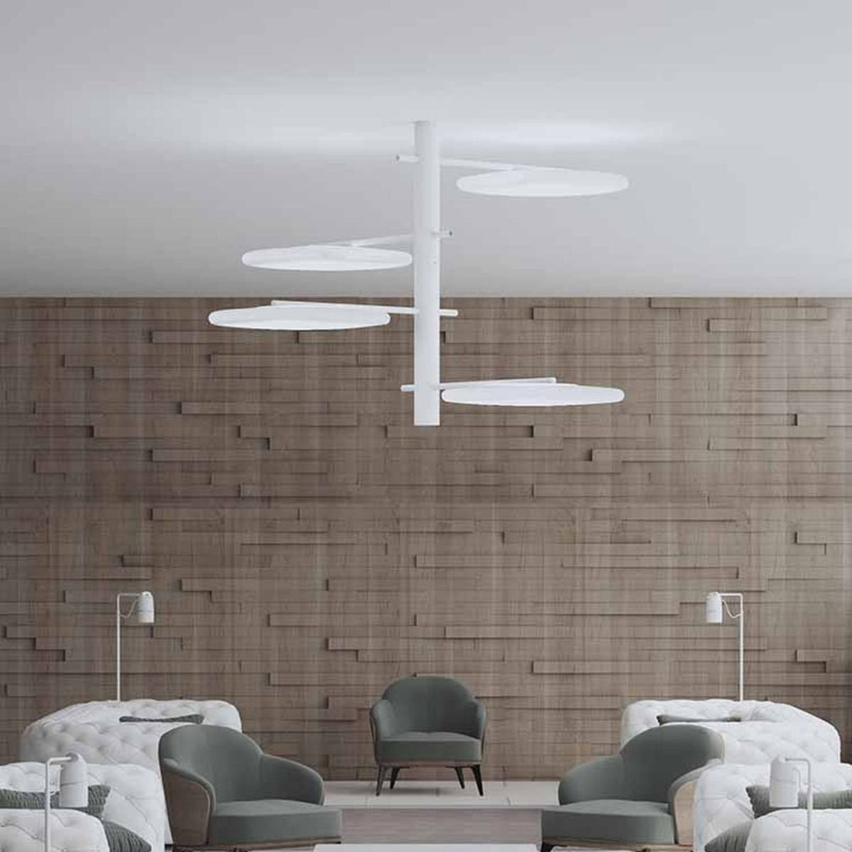 SuperMoon LED semi-flush ceiling light in white, with a central stem and four staggered arms holding crescent-cut round discs, shown above a lounge seating area with a wood-panelled wall.