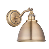 Endon Bramdale industrial wall light in brass with adjustable knuckle, dome shade, E14 lamp holder and toggle switch, shown on a white background.