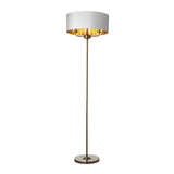 Endon Brenley 3 light floor lamp with wide white fabric shade, gold metallic inner lining and slim antique brass stem on a round base.