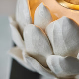 Aldgrove Table Lamp base close-up, artichoke-shaped ceramic petals in oatmeal crackle glaze with antique brass neck detail.