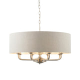Endon Brenley 8 light pendant with natural linen drum shade and brushed chrome multi-arm frame on a chain suspension, shown on a white background.