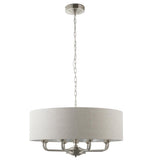 Endon Brenley pendant light with a wide fabric drum shade in natural linen, brushed chrome multi-arm frame and chain suspension on a white background.