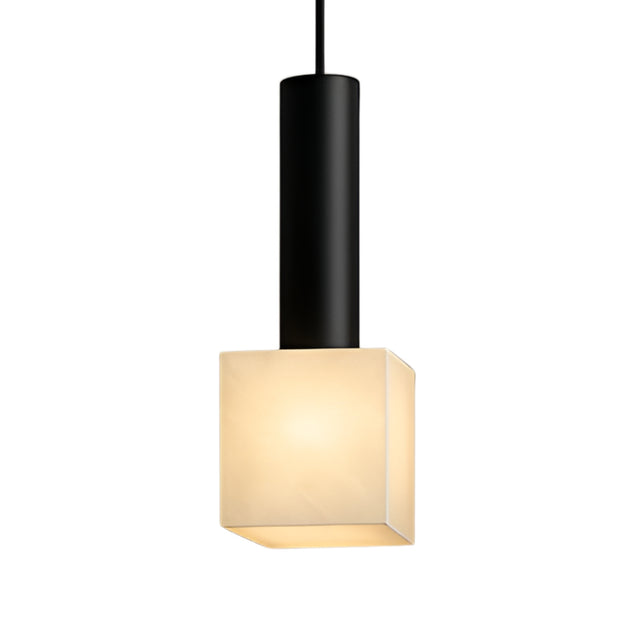 The Norevia 1 Light Cube Alabaster Single Pendant features a matte black stem and a glowing soft white frosted cube shade, suspended from a black cord against a white background.