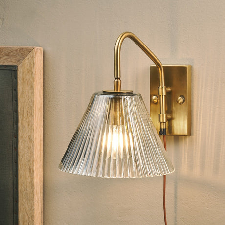 Akoli Glass Wall Lamp - Clear & Antique Brass, styled